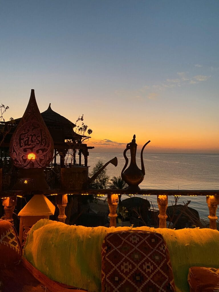 Serene sunset view at Farsha Cafe overlooking the Red Sea in South Sinai, Egypt.